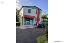 Three-story house and six and a half units of land